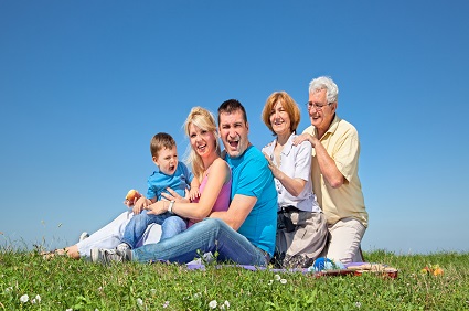 Happy family on picnic in park